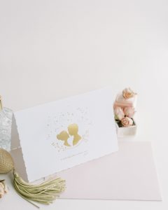 Gold foil card with the words I told the stars about you'.
