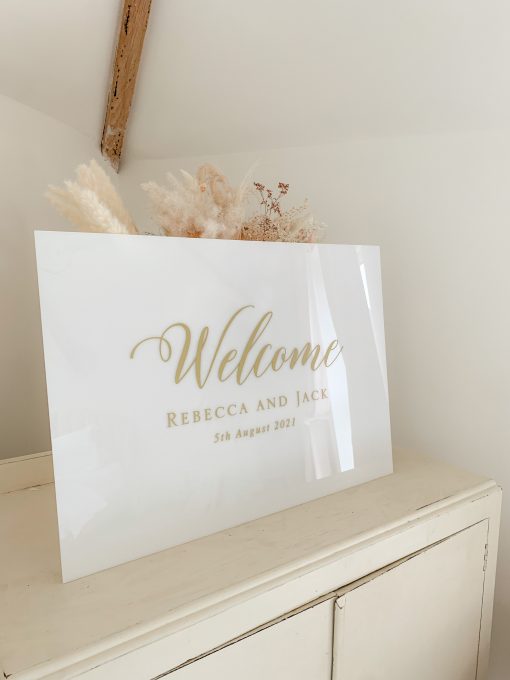 Welcome sign with gold foil on opal acrylic